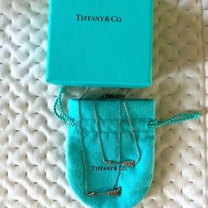 Tiffany & Co. Arrow necklace and bracelet set.